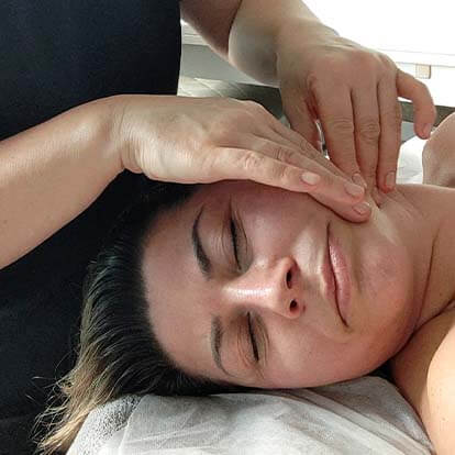 Photo of a lady receiving a face massage