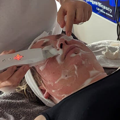Photo of a lady receiving a facial treatment